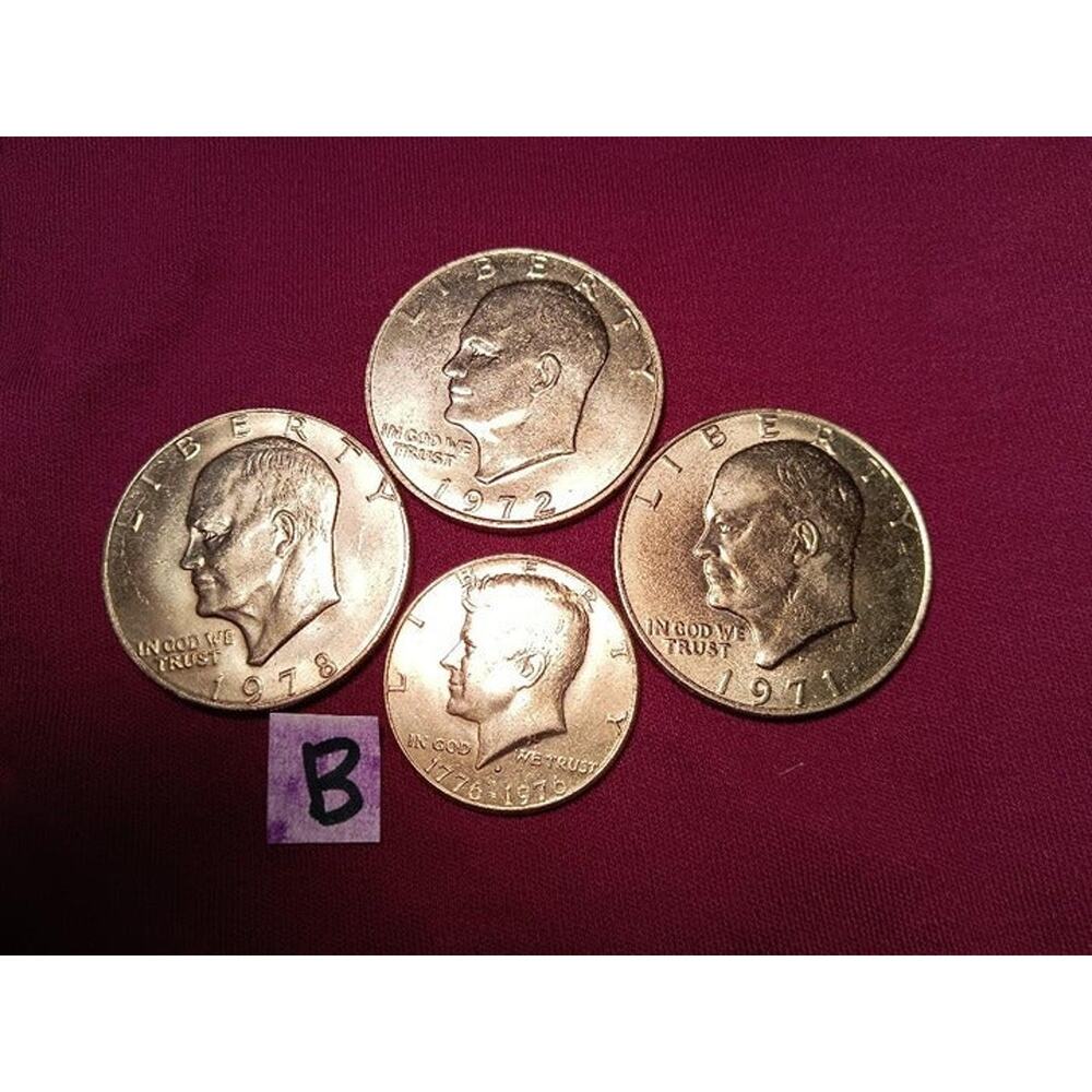 3 Ike Dollars and 1 Kennedy 1/2 Dollar